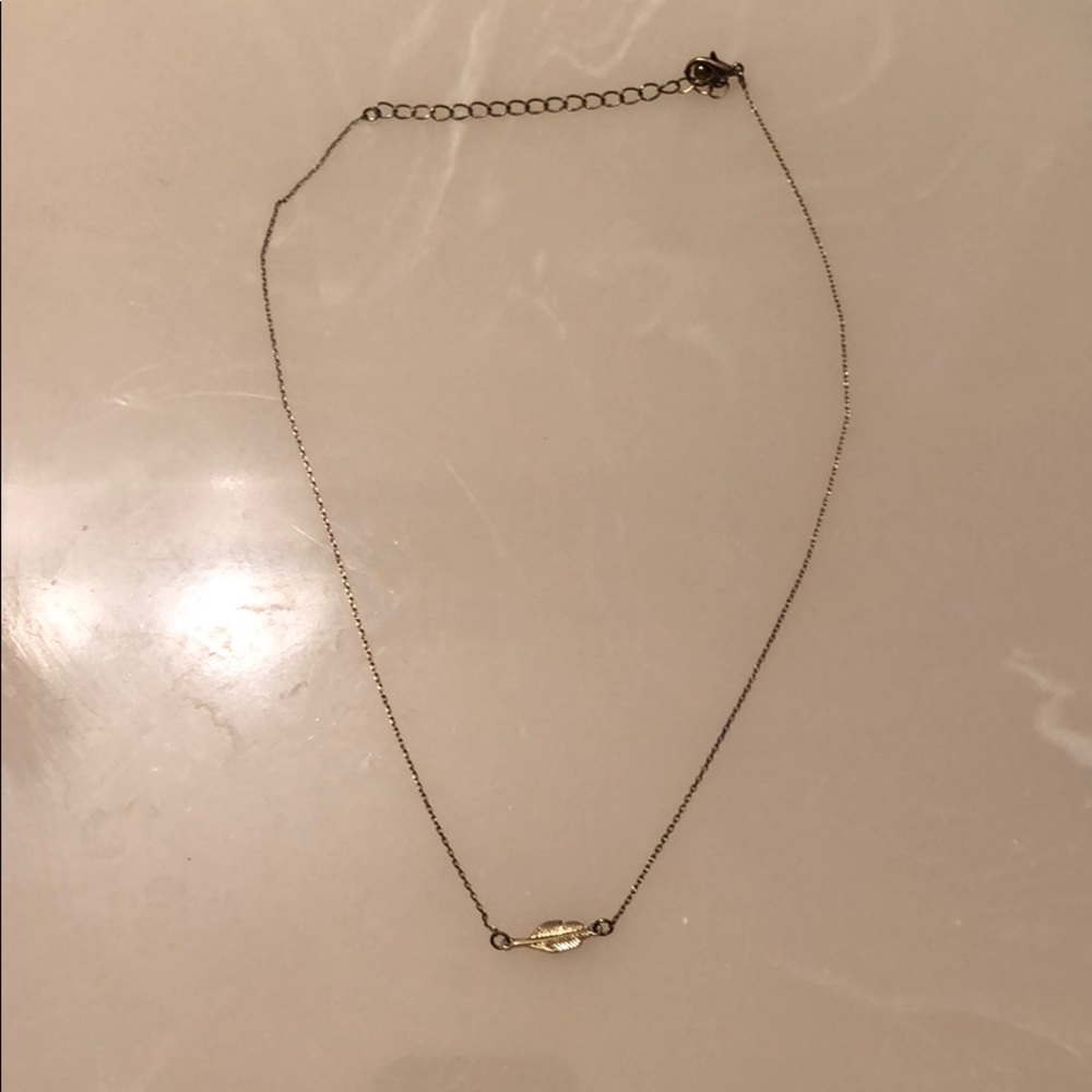 Gold feather necklace